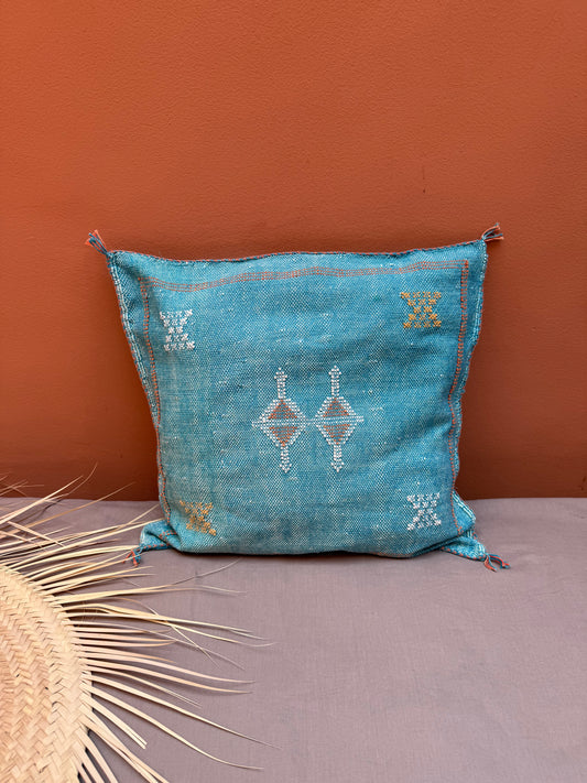 Housse de coussin en soie végétale turquoise
